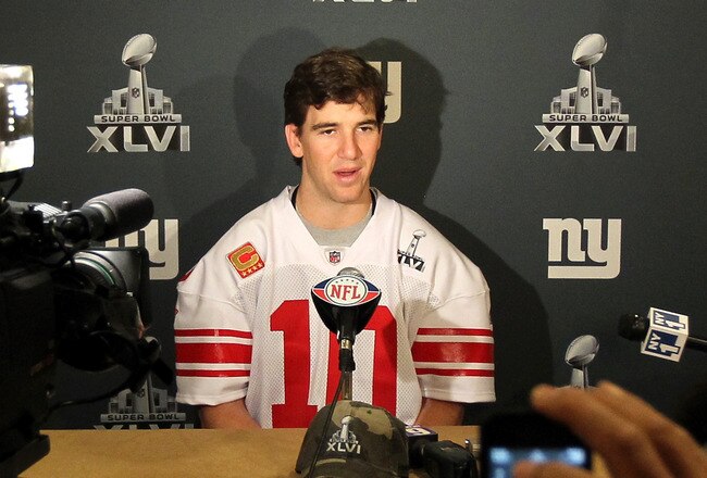 INDIANAPOLIS, IN - FEBRUARY 01:  Eli Manning #10 of the New York Giants answers questions from the press during a media availability session for Super Bowl XLVI at the Indianapolis Downtown Marriott on February 1, 2012 in Indianapolis, Indiana.  (Photo by Andy Lyons/Getty Images)