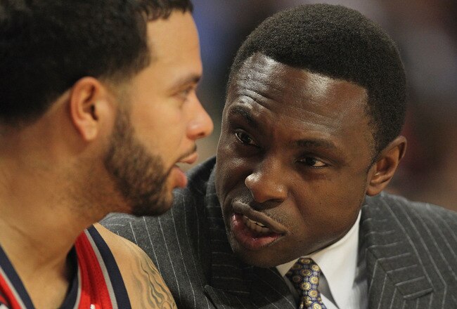 CHICAGO, IL - JANUARY 23: Head coach Avery Johnson of the New Jersey Nets talks with Deron Williams #8 on the bench during a game against the Chicago Bulls at the United Center on January 23, 2012 in Chicago, Illinois. The Bulls defeated the Nets 110-95. NOTE TO USER: User expressly acknowledges and agrees that, by downloading and or using this photograph, User is consenting to the terms and conditions of the Getty Images License Agreement. (Photo by Jonathan Daniel/Getty Images)