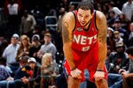 ATLANTA, GA - DECEMBER 30:  Deron Williams #8 of the New Jersey Nets reacts in the final seconds of their 105-98 loss to the Atlanta Hawks at Philips Arena on December 30, 2011 in Atlanta, Georgia.  NOTE TO USER: User expressly acknowledges and agrees that, by downloading and or using this photograph, User is consenting to the terms and conditions of the Getty Images License Agreement.  (Photo by Kevin C. Cox/Getty Images)