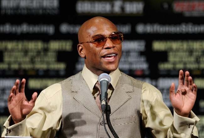 LAS VEGAS, NV - SEPTEMBER 17:  Boxer Floyd Mayweather Jr. speaks at a post-fight news conference after he defeated Victor Ortiz to win the WBC welterweight title at the MGM Grand Garden Arena September 17, 2011 in Las Vegas, Nevada.  (Photo by Ethan Miller/Getty Images)
