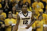 COLUMBIA, MO - JANUARY 03:  Marcus Denmon #12  of the Missouri Tigers in action during the game against the Oklahoma Sooners on January 3, 2012 at Mizzou Arena in Columbia, Missouri.  (Photo by Jamie Squire/Getty Images)