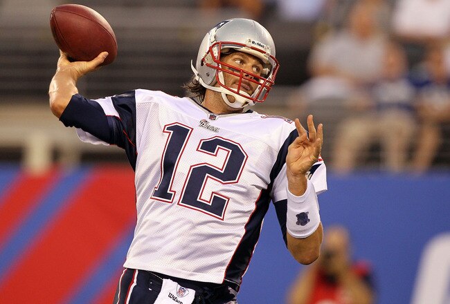 EAST RUTHERFORD, NJ - SEPTEMBER 02:  Tom Brady #12 of the New England Patriots throws a first quarter pass against the New York Giants on September 2, 2010 at the New Meadowlands Stadium in East Rutherford, New Jersey.  (Photo by Jim McIsaac/Getty Images)