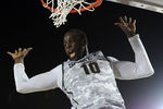 CORONADO, CA - NOVEMBER 11:  Draymond Green #10 of the Michigan State Spartans reacts after her dunk against the North Carolina Tar Heels during the Quicken Loans Carrier Classic on board the USS Carl Vinson on November 11, 2011 in Coronado, California.  (Photo by Harry How/Getty Images)