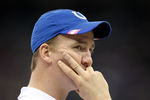 NEW ORLEANS, LA - OCTOBER 23:  Injured quarterback Peyton Manning #18 of the Indianapolis Colts watches from the sidelines during the game against the New Orleans Saints on October 23, 2011 at Mercedes-Benz Superdome in New Orleans, Louisiana.  (Photo by Jamie Squire/Getty Images)