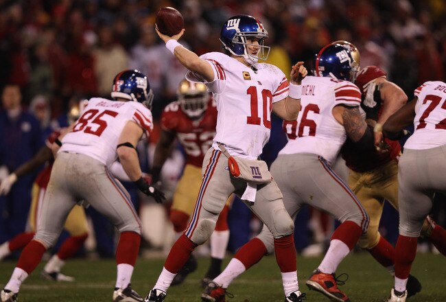 SAN FRANCISCO, CA - JANUARY 22: Eli Manning #10 of the New York Giants passes against the San Francisco 49ers during the second half of the NFC Championship Game at Candlestick Park on January 22, 2012 in San Francisco, California.  (Photo by Ezra Shaw/Getty Images)