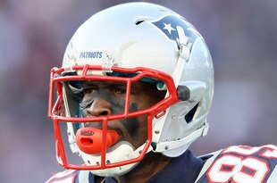 FOXBORO, MA - JANUARY 01: Chad Ochocinco #85 of the New England Patriots heads off the field in the second half against the Buffalo Bills on January 1, 2012 at Gillette Stadium in Foxboro, Massachusetts.  (Photo by Elsa/Getty Images)