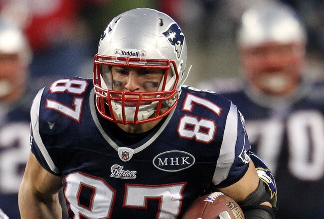 FOXBORO, MA - JANUARY 22:   Rob Gronkowski #87 of the New England Patriots runs with the ball against the Baltimore Ravens during their AFC Championship Game at Gillette Stadium on January 22, 2012 in Foxboro, Massachusetts.  (Photo by Jim Rogash/Getty Images)