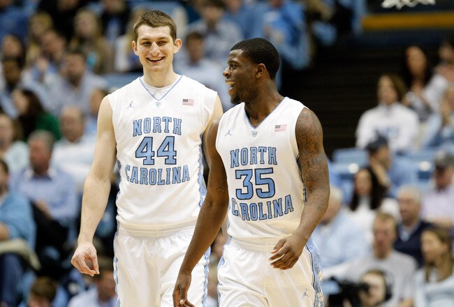 CHAPEL HILL, NC - JANUARY 29:  Teammates Tyler Zeller #44 and Reggie Bullock #35 of the North Carolina Tar Heels react to a play during their game against the Georgia Tech Yellow Jackets at the Dean Smith Center on January 29, 2012 in Chapel Hill, North Carolina.  (Photo by Streeter Lecka/Getty Images)