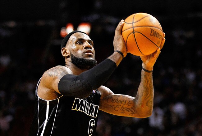 MIAMI, FL - JANUARY 29:  LeBron James #6 of the Miami Heat shoots a foul shot during a game against the Chicago Bulls at American Airlines Arena on January 29, 2012 in Miami, Florida. NOTE TO USER: User expressly acknowledges and agrees that, by downloading and/or using this Photograph, User is consenting to the terms and conditions of the Getty Images License Agreement.  (Photo by Mike Ehrmann/Getty Images)