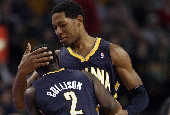 BOSTON, MA - JANUARY 06:  Danny Granger #33 of the Indiana Pacers congratulates Darren Collison #2 after Collison shot a 3-point shot late in the fourth quarter against the Boston Celtics on January 6, 2012 at TD Garden in Boston, Massachusetts. The Indiana Pacers defeated the Boston Celtics 87-74. NOTE TO USER: User expressly acknowledges and agrees that, by downloading and or using this photograph, User is consenting to the terms and conditions of the Getty Images License Agreement.  (Photo by Elsa/Getty Images)