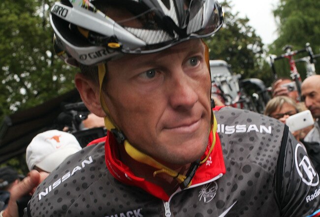 PAU, FRANCE - JULY 22: Lance Armstrong with team RadioShack heads to the start of stage 17 of the Tour de France on July 22, 2010 in Pau, France. Luxembourg's Andy Schleck won the stage while Spaniard Alberto Contador kept the race leaders yellow jersey. The last stage in the Pyrenees, the 174km route from Pau to Col du Tourmalet includes some of the most difficult climbs of the Tour. The iconic bicycle race will include a total of 20 stages and will cover 3,642km before concluding in Paris on July 25.  (Photo by Spencer Platt/Getty Images)