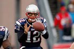 FOXBORO, MA - JANUARY 22:  Tom Brady #12 of the New England Patriots hikes the ball against the Baltimore Ravens during their AFC Championship Game at Gillette Stadium on January 22, 2012 in Foxboro, Massachusetts.  (Photo by Rob Carr/Getty Images)