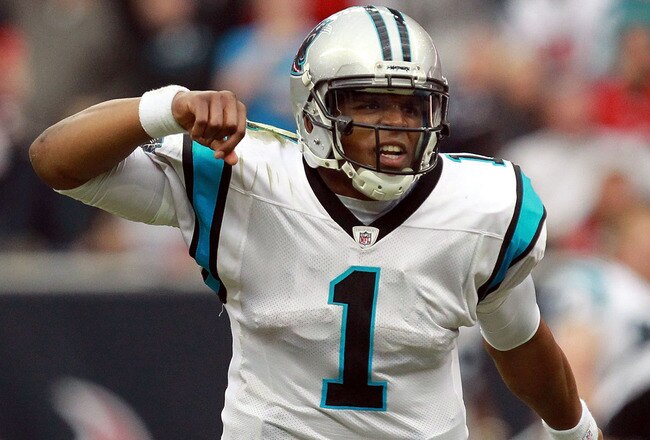 HOUSTON, TX - DECEMBER 18:  Cam Newton #1 of the Carolina Panthers celebrates a touchdown against the Houston Texans at Reliant Stadium on December 18, 2011 in Houston, Texas.  (Photo by Ronald Martinez/Getty Images)
