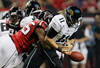 ATLANTA, GA - DECEMBER 15:  John Abraham #55 of the Atlanta Falcons forces a fumble as he sacks Blaine Gabbert #11 of the Jacksonville Jaguars in the first half at the Georgia Dome on December 15, 2011 in Atlanta, Georgia.  (Photo by Kevin C. Cox/Getty Images)