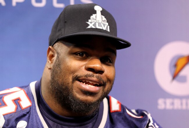 INDIANAPOLIS, IN - JANUARY 31:  Vince Wilfork #75 of the New England Patriots answers questions from the media during Media Day ahead of Super Bowl XLVI against the New York Giants at Lucas Oil Stadium on January 31, 2012 in Indianapolis, Indiana.  (Photo by Michael Heiman/Getty Images)