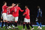 MANCHESTER, ENGLAND - JANUARY 31:  Dimitar Berbatov of Manchester United celebrates his goal with team mates during the Barclays Premier League match between Manchester United and Stoke City at Old Trafford on January 31, 2012 in Manchester, England.  (Photo by Jamie McDonald/Getty Images)
