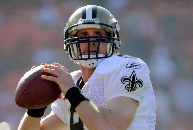 SAN FRANCISCO, CA - JANUARY 14:  Drew Brees #9 of the New Orleans Saints warms up before his team takes on the San Francisco 49ers in the NFC Divisional playoff game at Candlestick Park on January 14, 2012 in San Francisco, California.  (Photo by Thearon W. Henderson/Getty Images)