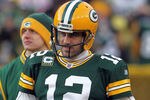 GREEN BAY, WI - JANUARY 15:  Aaron Rodgers #12 of the Green Bay Packers looks on against the New York Giants during their NFC Divisional playoff game at Lambeau Field on January 15, 2012 in Green Bay, Wisconsin.  (Photo by Jonathan Daniel/Getty Images)