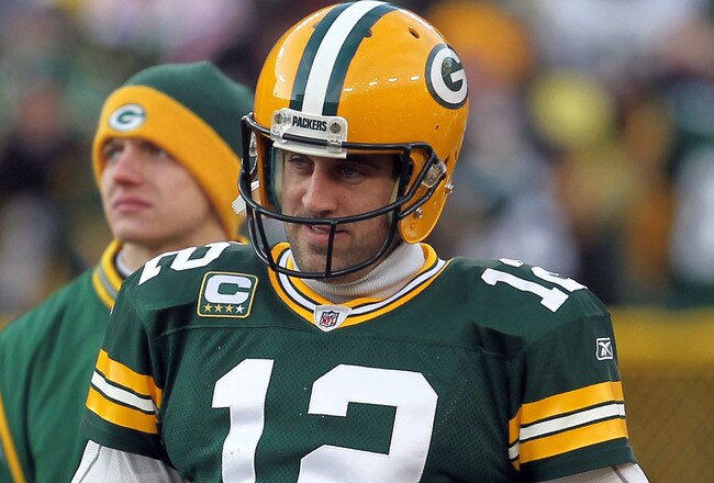 GREEN BAY, WI - JANUARY 15:  Aaron Rodgers #12 of the Green Bay Packers looks on against the New York Giants during their NFC Divisional playoff game at Lambeau Field on January 15, 2012 in Green Bay, Wisconsin.  (Photo by Jonathan Daniel/Getty Images)