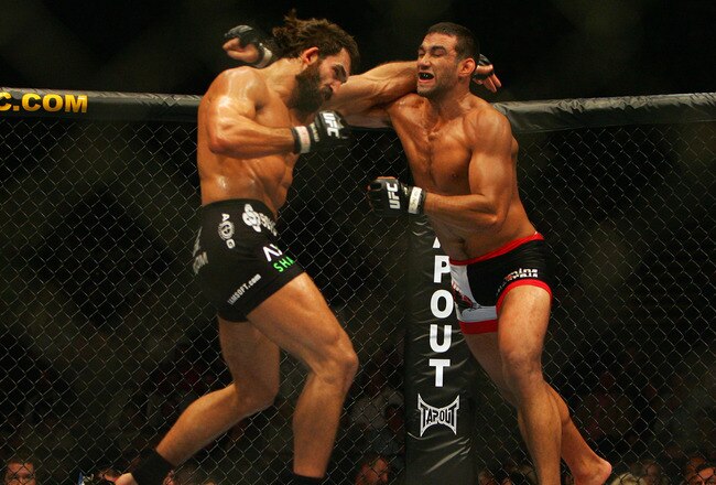 MANCHESTER, UNITED KINGDOM - APRIL 21: Andrei Arlovski of USA and Fabricio Werdum of Brazil in action during a Heavyweight bout of the Ultimate Fighting Championship at the Manchester Evening News Arena on April 21, 2007 in Manchester, England (Photo by Gary M. Prior/Getty Images).