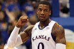 LAWRENCE, KS - FEBRUARY 01:  Thomas Robinson #0 of the Kansas Jayhawks reacts after scoring during the game against the Oklahoma Sooners on February 1, 2012 at Allen Fieldhouse in Lawrence, Kansas.  (Photo by Jamie Squire/Getty Images)