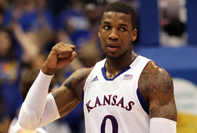 LAWRENCE, KS - FEBRUARY 01:  Thomas Robinson #0 of the Kansas Jayhawks reacts after scoring during the game against the Oklahoma Sooners on February 1, 2012 at Allen Fieldhouse in Lawrence, Kansas.  (Photo by Jamie Squire/Getty Images)