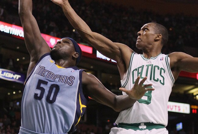 BOSTON, MA - MARCH 23:  Zach Randolph #50 of the Memphis Grizzlies takes a shot as Rajon Rondo #9 of the Boston Celtics defends on March 23, 2011 at the TD Garden in Boston, Massachusetts.  NOTE TO USER: User expressly acknowledges and agrees that, by downloading and/or using this Photograph, User is consenting to the terms and conditions of the Getty Images License Agreement.  (Photo by Elsa/Getty Images)