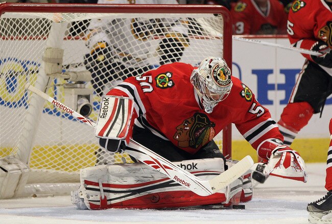 CHICAGO, IL - JANUARY 18: Cory Crawford #50 of the Chicago Blackhawks makes a save against the Buffalo Sabres at the United Center on January 18, 2012 in Chicago, Illinois. (Photo by Jonathan Daniel/Getty Images)