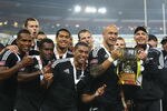 WELLINGTON, NEW ZEALAND - FEBRUARY 04:  New Zealand captain DJ Forbes and coach Gordon Tietjens hold up the trophy after winning the Cup Final against Fiji on day two of the Wellington Sevens at Westpac Stadium on February 4, 2012 in Wellington, New Zealand.  (Photo by Phil Walter/Getty Images)