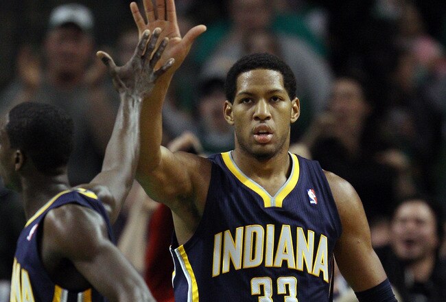 BOSTON, MA - JANUARY 06: Danny Granger #33 of the Indiana Pacers is congratulated by teammate Darren Collison #3 after Granger drew the foul in the second half against the Boston Celtics on January 6, 2012 at TD Garden in Boston, Massachusetts. The Indiana Pacers defeated the Boston Celtics 87-74. NOTE TO USER: User expressly acknowledges and agrees that, by downloading and or using this photograph, User is consenting to the terms and conditions of the Getty Images License Agreement.  (Photo by Elsa/Getty Images)