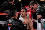 NEW YORK - OCTOBER 22:  Nonito Donaire of the Philippines sit in his corner during the fight against  Omar Narvaez of Argentina in theWBC, WBO World Bantamweight Title bout at Madison Square Garden on October 22, 2011 in New York City.  (Photo by Chris Trotman/Getty Images)