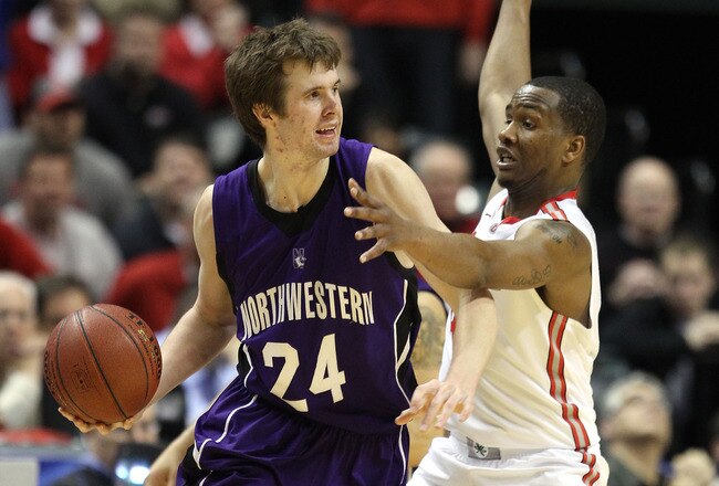 INDIANAPOLIS, IN - MARCH 11:  John Shurna #24 of the Northwestern Wildcats looks to pass against the William Buford #44 of the Ohio State Buckeyes during the quarterfinals of the 2011 Big Ten Men's Basketball Tournament at Conseco Fieldhouse on March 11, 2011 in Indianapolis, Indiana. Ohio State won 67-61 in overtime. (Photo by Andy Lyons/Getty Images)