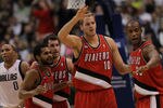 DALLAS, TX - DECEMBER 15:  (L-R) Patrick Mills #8, Rudy Fernandez #4, Joel Przybilla #10 and Dante Cunningham #33 of the Portland Trail Blazers at American Airlines Center on December 15, 2010 in Dallas, Texas.  NOTE TO USER: User expressly acknowledges and agrees that, by downloading and or using this photograph, User is consenting to the terms and conditions of the Getty Images License Agreement.  (Photo by Ronald Martinez/Getty Images)