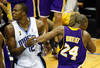ORLANDO, FL - JUNE 11:  Dwight Howard #12 of the Orlando Magic and Kobe Bryant #24 of the Los Angeles Lakers exchange words in the third quarter in Game Four of the 2009 NBA Finals on June 11, 2009 at Amway Arena in Orlando, Florida.  NOTE TO USER:  User expressly acknowledges and agrees that, by downloading and or using this photograph, User is consenting to the terms and conditions of the Getty Images License Agreement.  (Photo by Ronald Martinez/Getty Images)
