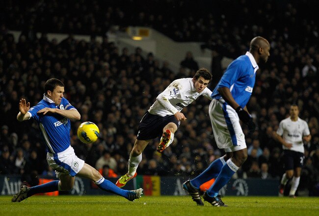 LONDON, ENGLAND - JANUARY 31:  Gareth Bale of Spurs has a shot at goal during the Barclays Premier League match between Tottenham Hotspur and Wigan Athletic at White Hart Lane on January 31, 2012 in London, England.  (Photo by Paul Gilham/Getty Images)