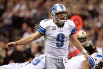 NEW ORLEANS, LA - JANUARY 07:  Matthew Stafford #9 of the Detroit Lions shouts out a play against the New Orleans Saints during their 2012 NFC Wild Card Playoff game at Mercedes-Benz Superdome on January 7, 2012 in New Orleans, Louisiana.  (Photo by Ronald Martinez/Getty Images)
