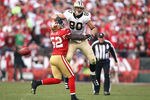 SAN FRANCISCO, CA - JANUARY 14:  Patrick Willis #52 of the San Francisco 49ers forces an incomplete pass against Jimmy Graham #80 of the New Orleans Saints during the fourth quarter of the NFC Divisional playoff game at Candlestick Park on January 14, 2012 in San Francisco, California.  (Photo by Ezra Shaw/Getty Images)