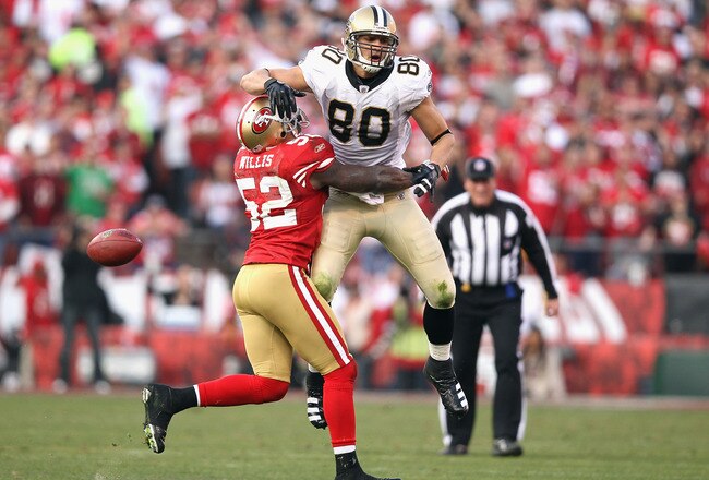 SAN FRANCISCO, CA - JANUARY 14:  Patrick Willis #52 of the San Francisco 49ers forces an incomplete pass against Jimmy Graham #80 of the New Orleans Saints during the fourth quarter of the NFC Divisional playoff game at Candlestick Park on January 14, 2012 in San Francisco, California.  (Photo by Ezra Shaw/Getty Images)