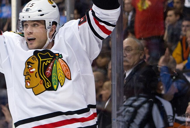 VANCOUVER, CANADA - JANUARY 31: Viktor Stalberg #25 of the Chicago Blackhawks celebrates after scoring against the Vancouver Canucks during the third period in NHL action on January 31, 2012 at Rogers Arena in Vancouver, British Columbia, Canada.  (Photo by Rich Lam/Getty Images)