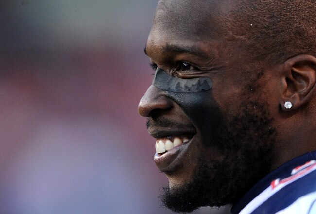 DENVER, CO - DECEMBER 18: Wide receiver Chad Ochocinco #85 of the New England Patriots looks on at play against the Denver Broncos at Sports Authority Field at Mile High on December 18, 2011 in Denver, Colorado. The New England Patriots won, 41-23. (Photo by Patrick Smith/Getty Images)