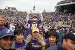 SEATTLE - SEPTEMBER 19: Players and fans celebrate the Washington Huskies' 16-13 defeat of the USC Trojans on September 19, 2009 at Husky Stadium in Seattle, Washington. (Photo by Otto Greule Jr/Getty Images)