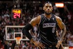 MIAMI, FL - JANUARY 29:  LeBron James #6 of the Miami Heat looks on during a game against the Chicago Bulls at American Airlines Arena on January 29, 2012 in Miami, Florida. NOTE TO USER: User expressly acknowledges and agrees that, by downloading and/or using this Photograph, User is consenting to the terms and conditions of the Getty Images License Agreement.  (Photo by Mike Ehrmann/Getty Images)