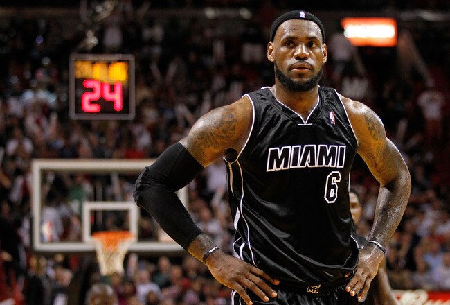MIAMI, FL - JANUARY 29:  LeBron James #6 of the Miami Heat looks on during a game against the Chicago Bulls at American Airlines Arena on January 29, 2012 in Miami, Florida. NOTE TO USER: User expressly acknowledges and agrees that, by downloading and/or using this Photograph, User is consenting to the terms and conditions of the Getty Images License Agreement.  (Photo by Mike Ehrmann/Getty Images)