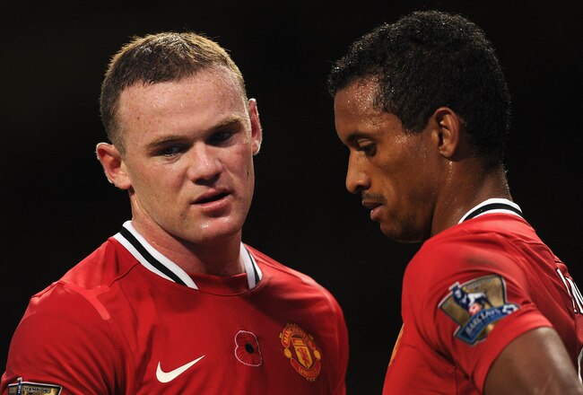 MANCHESTER, ENGLAND - NOVEMBER 05: Wayne Rooney and Nani of Manchester United look on during the Barclays Premier League match between Manchester United and Sunderland at Old Trafford on November 5, 2011 in Manchester, England.  (Photo by Michael Regan/Getty Images)