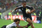 WELLINGTON, NEW ZEALAND - FEBRUARY 04:  Frank Halai of New Zealand breaks through the tackle of Osea Kolinisau of Fiji to score a try during the Cup Final on day two of the Wellington Sevens at Westpac Stadium on February 4, 2012 in Wellington, New Zealand.  (Photo by Phil Walter/Getty Images)