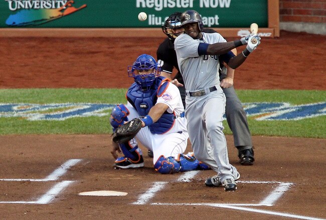 NEW YORK, NY - AUGUST 08:  Cameron Maybin #24 of the San Diego Padres connects on a first inning infield single against the New York Mets at Citi Field on August 8, 2011 in the Flushing neighborhood of the Queens borough of New York City.  (Photo by Jim McIsaac/Getty Images)