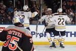 UNIONDALE, NY - FEBRUARY 04: Paul Gaustad #28 of the Buffalo Sabres (C) scores at 11:46 of the third period against the New York Islanders and is joined by Luke Adam #72 (L) and Brad Boyes #22 (R) at the Nassau Veterans Memorial Coliseum on February 4, 2012 in Uniondale, New York. The Sabres defeated the Islanders 4-3 in the shootout. (Photo by Bruce Bennett/Getty Images)