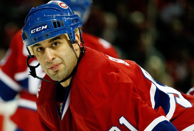 MONTREAL- OCTOBER 17:  Scott Gomez #91 of the Montreal Canadiens waits for a faceoff during the NHL game against the Ottawa Senators on October 17, 2009 at the Bell Centre in Montreal, Quebec, Canada.  The Senators defeated the Canadiens 3-1.  (Photo by Richard Wolowicz/Getty Images)