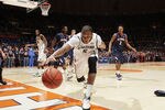 CHAMPAIGN, IL - JANUARY 31: Adreian Payne #5 of the Michigan State Spartans tries to save the ball from going out of bounds during the game against the Illinois Fighting Illini at Assembly Hall on January 31, 2012 in Champaign, Illinois. Illinois defeated Michigan State 42-41. (Photo by Joe Robbins/Getty Images)