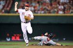 CINCINNATI, OH - AUGUST 26:  Todd Frazier #21 of the Cincinnati Reds forces Jonny Gomes #30 of the Washington Nationals out at second base but then holds back from completing a double play at Great American Ball Park on August 26, 2011 in Cincinnati, Ohio.  (Photo by Jamie Sabau/Getty Images)